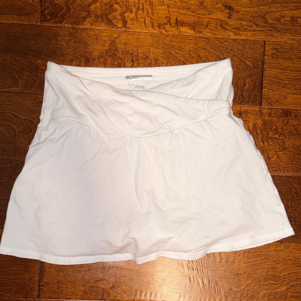 Crossover White Skort Size M. With shorts and pocket